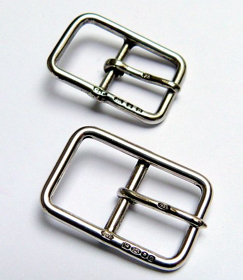Hallmarked Type GW sterling silver buckle with original in background